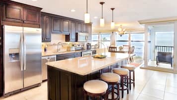 Condo, 2 Bedrooms | Private kitchen | Fridge, microwave, oven, stovetop