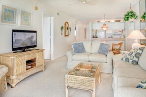 Condo, 2 Bedrooms | Living area | Flat-screen TV, books - Mariner Point 1082 (Sanibel)