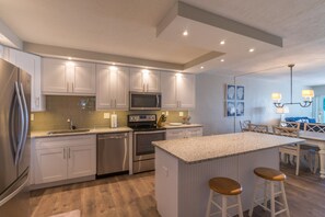 Condo, 2 Bedrooms | Private kitchen | Fridge, microwave, oven, stovetop