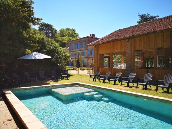 Seasonal outdoor pool, pool umbrellas, pool loungers