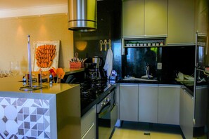 Apartamento | Cozinha privada | Geladeira, micro-ondas, fogão, torradeira