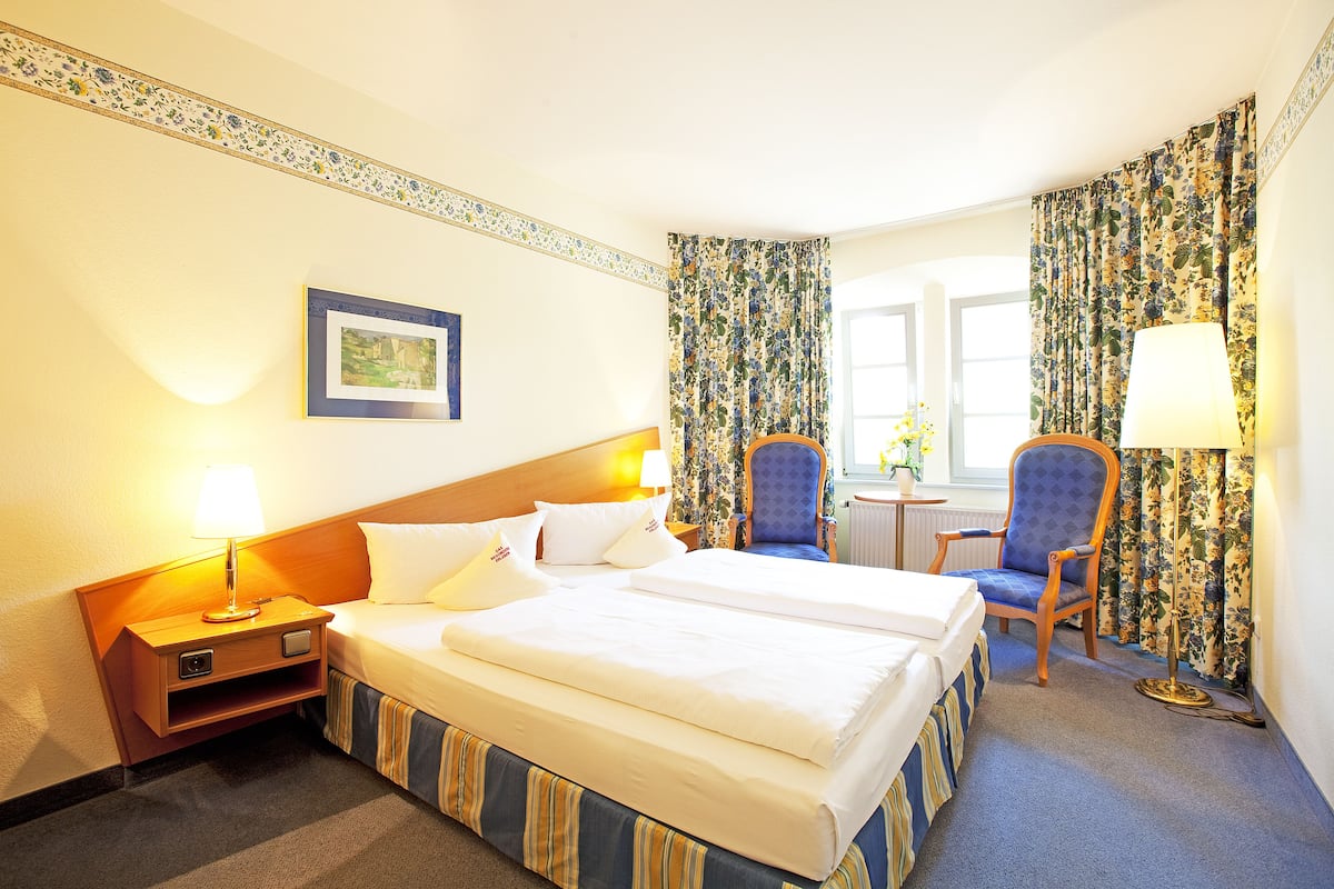 standard double room single use | in-room safe, desk, iron/ironing board, cots/infant beds