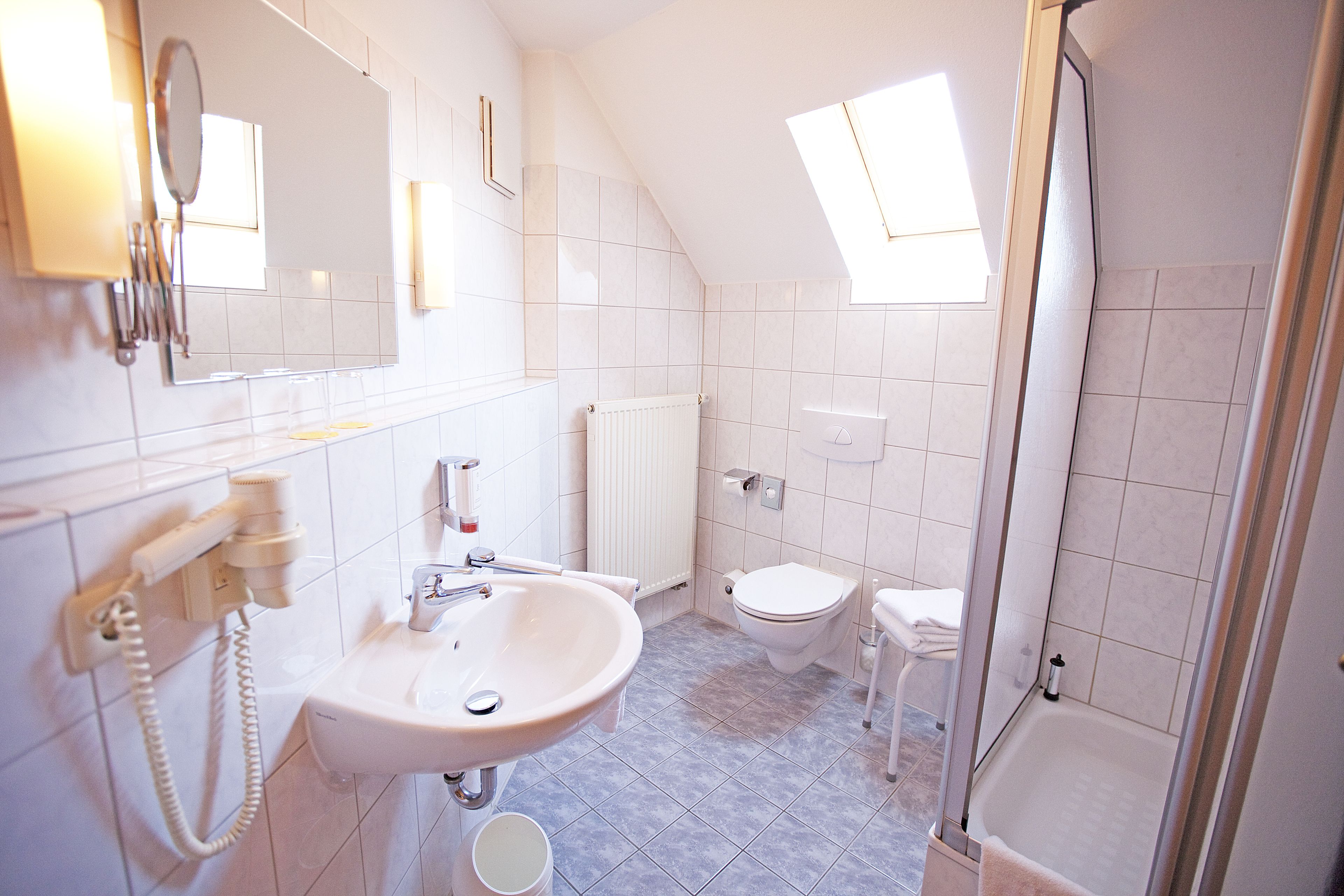 shower, free toiletries, hair dryer, towels