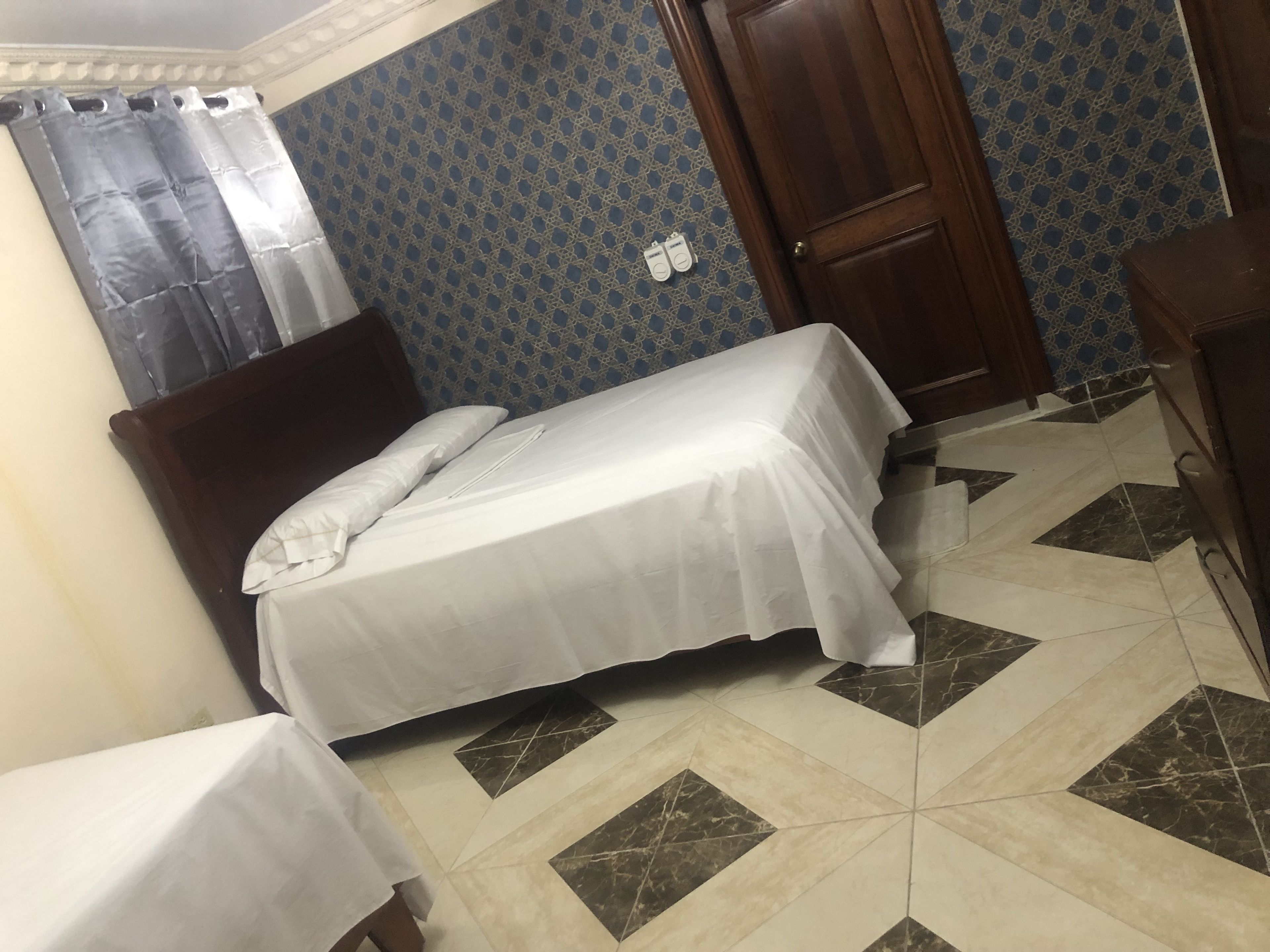 Desk, laptop workspace, blackout curtains, free WiFi