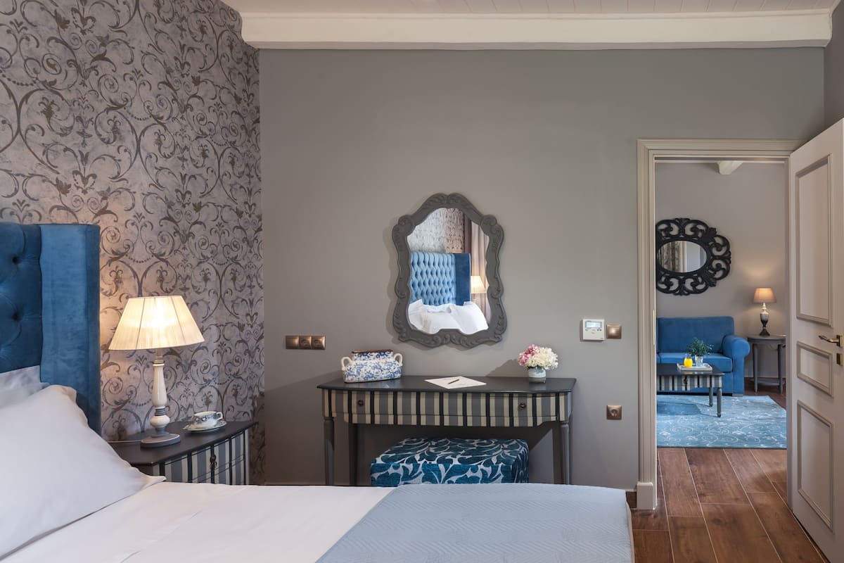 superior suite, garden view | premium bedding, minibar, in-room safe, individually furnished