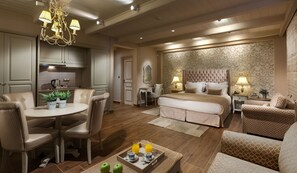 Suite junior, vistas al jardín | Ropa de cama de alta calidad, minibar, caja fuerte