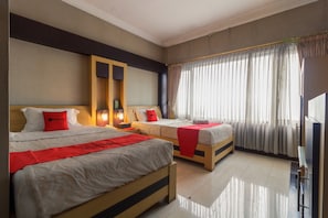 Chambre avec lits jumeaux | 1 chambre, bureau, Wi-Fi gratuit, draps fournis