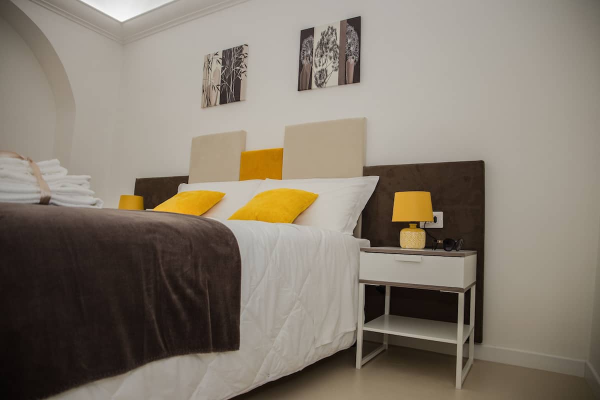 Quadruple Room, Private Bathroom | In-room safe, desk, laptop workspace, iron/ironing board (on request)