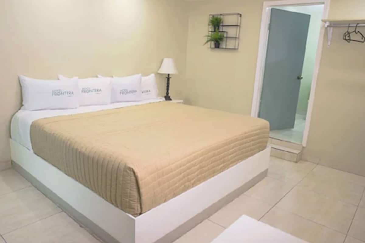 Deluxe Room, 1 King Bed | Individually decorated, desk, blackout curtains, iron/ironing board