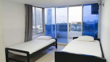 Apartemen Comfort, Beberapa Tempat Tidur (Apto 8A) | Area keluarga | TV plasma