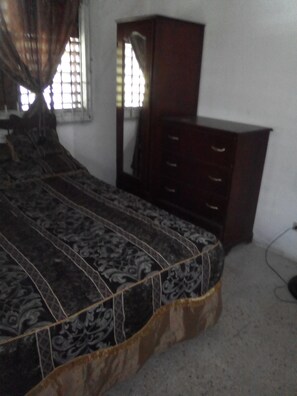 Basic Double Room, 1 Double Bed, Garden View | Blackout curtains, iron/ironing board, free cots/infant beds, bed sheets