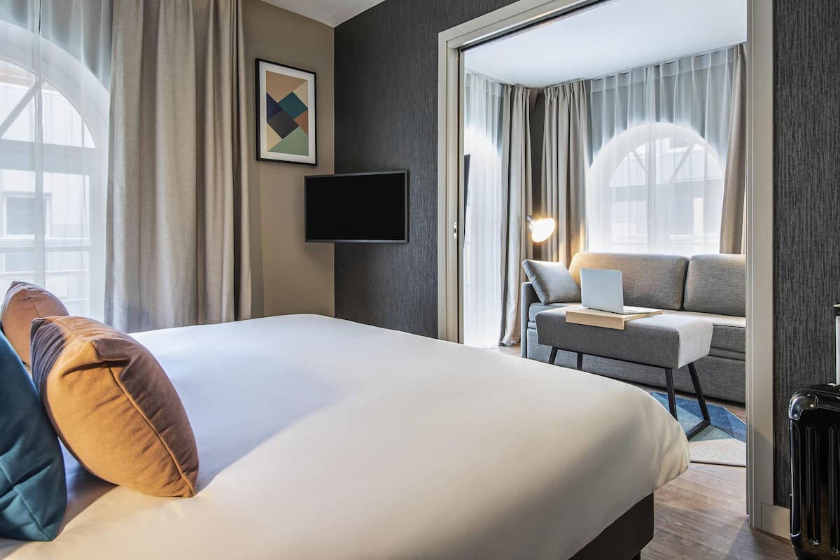 Apartment, 1 Bedroom | In-room safe, blackout curtains, soundproofing, iron/ironing board