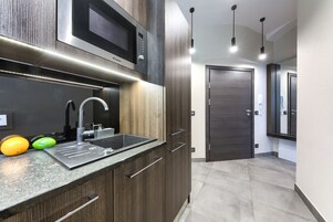 Apartment, 1 Bedroom | Private kitchenette | Fridge, microwave, stovetop, dishwasher