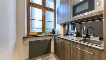 Departamento, 1 habitación | Cocineta privada | Refrigerador, microondas, parrilla de estufa y lavavajillas