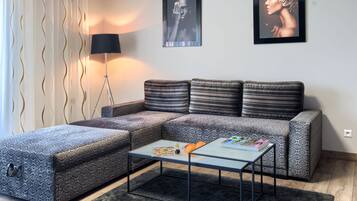 Appartement Majestueux | Salle de séjour | Télévision LED