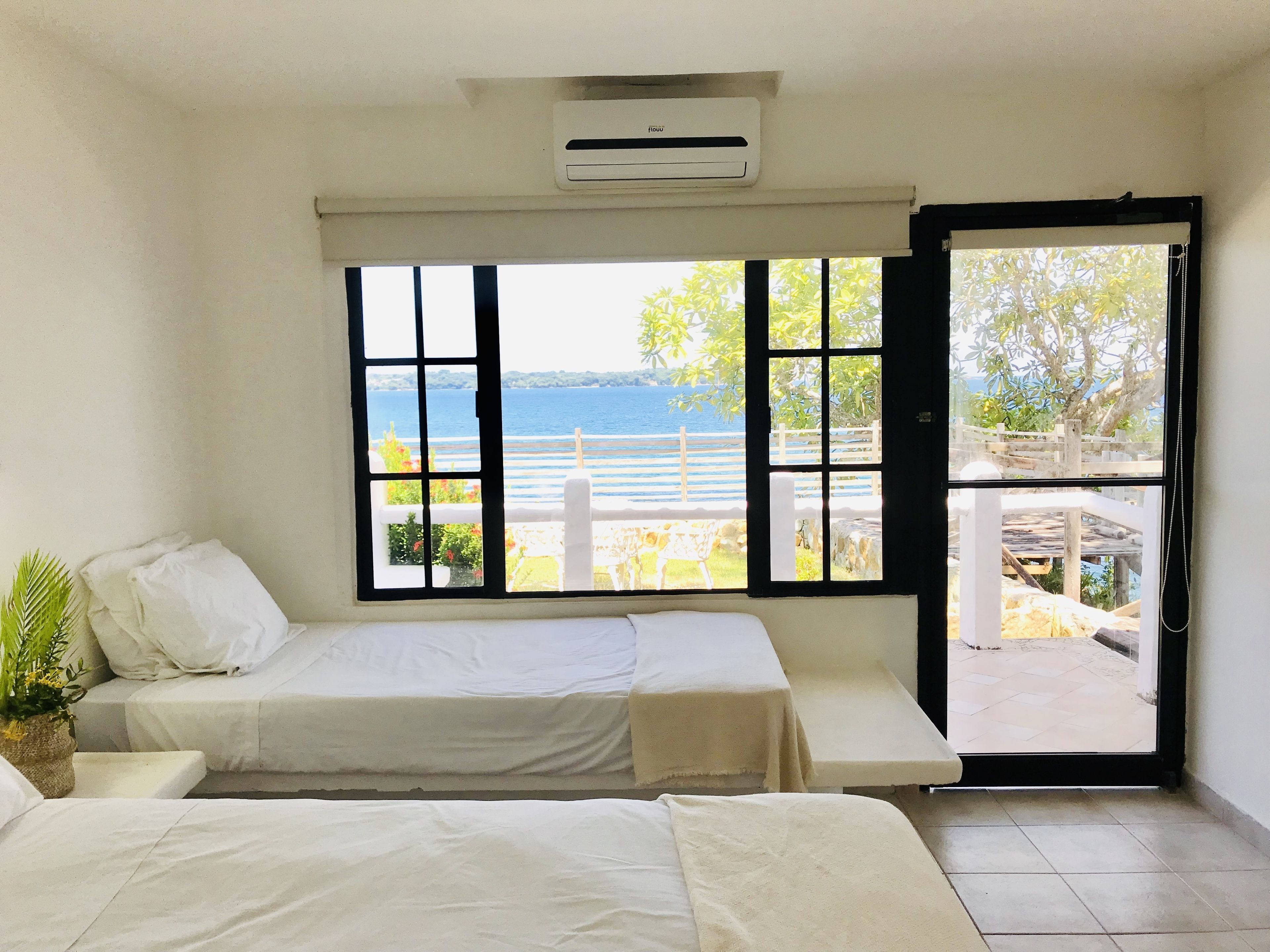 Triple Room, Non Smoking, Ocean View | Blackout curtains, iron/ironing board, free WiFi, bed sheets