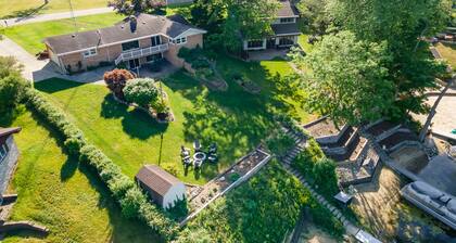 Lakefront home w Private Beach, Hot Tub, Sauna