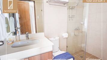 Hair dryer, towels, soap, shampoo