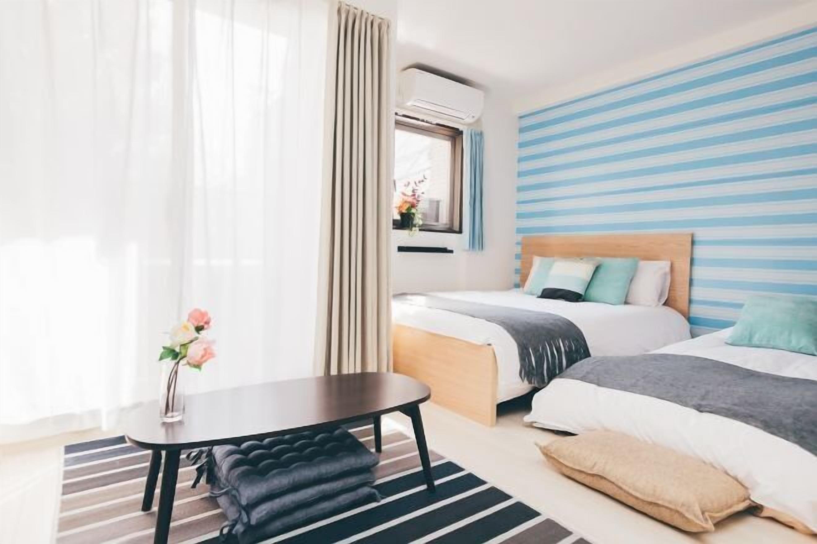 Desk, blackout drapes, soundproofing, free WiFi