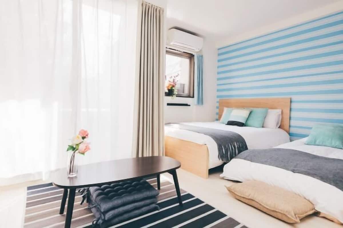 Desk, blackout curtains, soundproofing, free WiFi