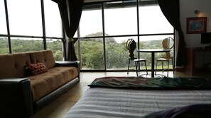 Honeymoon Suite, 1 King Bed with Sofa bed (Suite Terrés) | Iron/ironing board, bed sheets - Echological - Glamping (Lagos de Moreno)