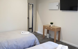 Standard Queen and Single Room, Multiple Beds, Shared Bathroom | Desk, blackout curtains, iron/ironing board, free WiFi