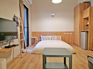 Habitación triple familiar | Minibar, cortinas opacas, sistema de insonorización y camas supletorias