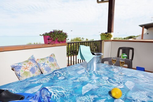 Appartement familial directement sur la plage avec vue sur la mer
