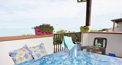 Appartement familial directement sur la plage avec vue sur la mer