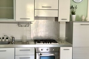 Fridge, oven, dining tables