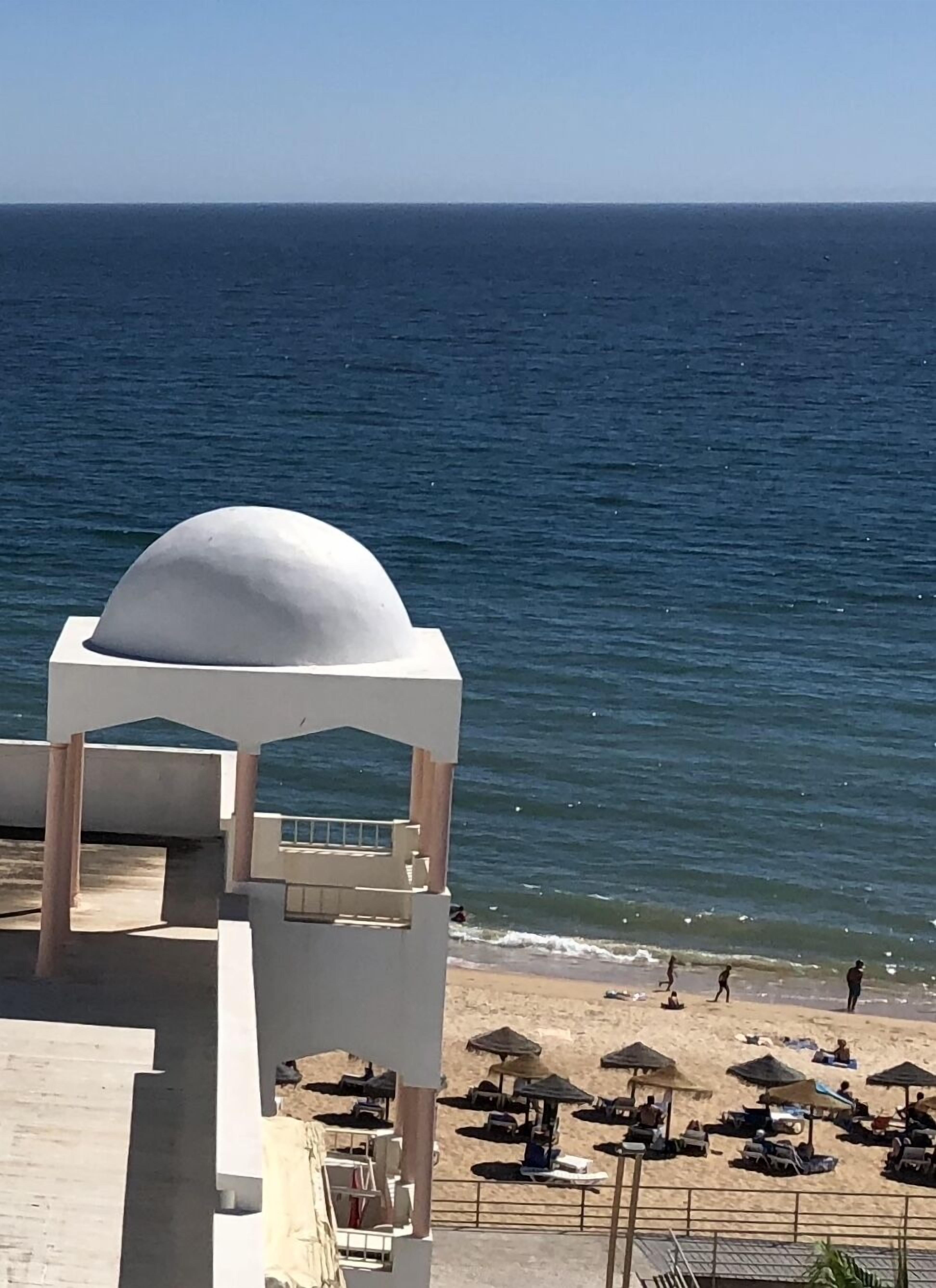 On the beach, beach towels