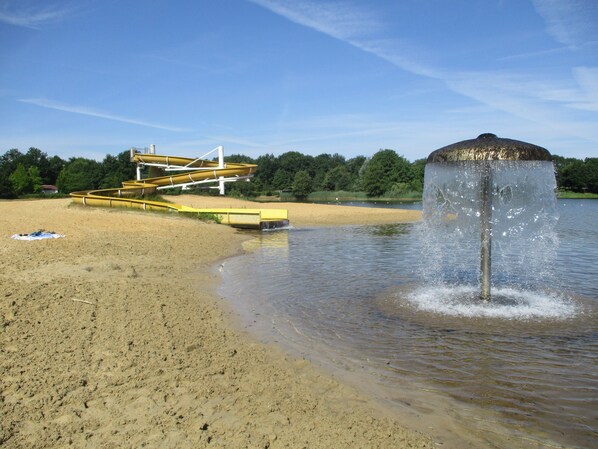 On the beach, sun-loungers