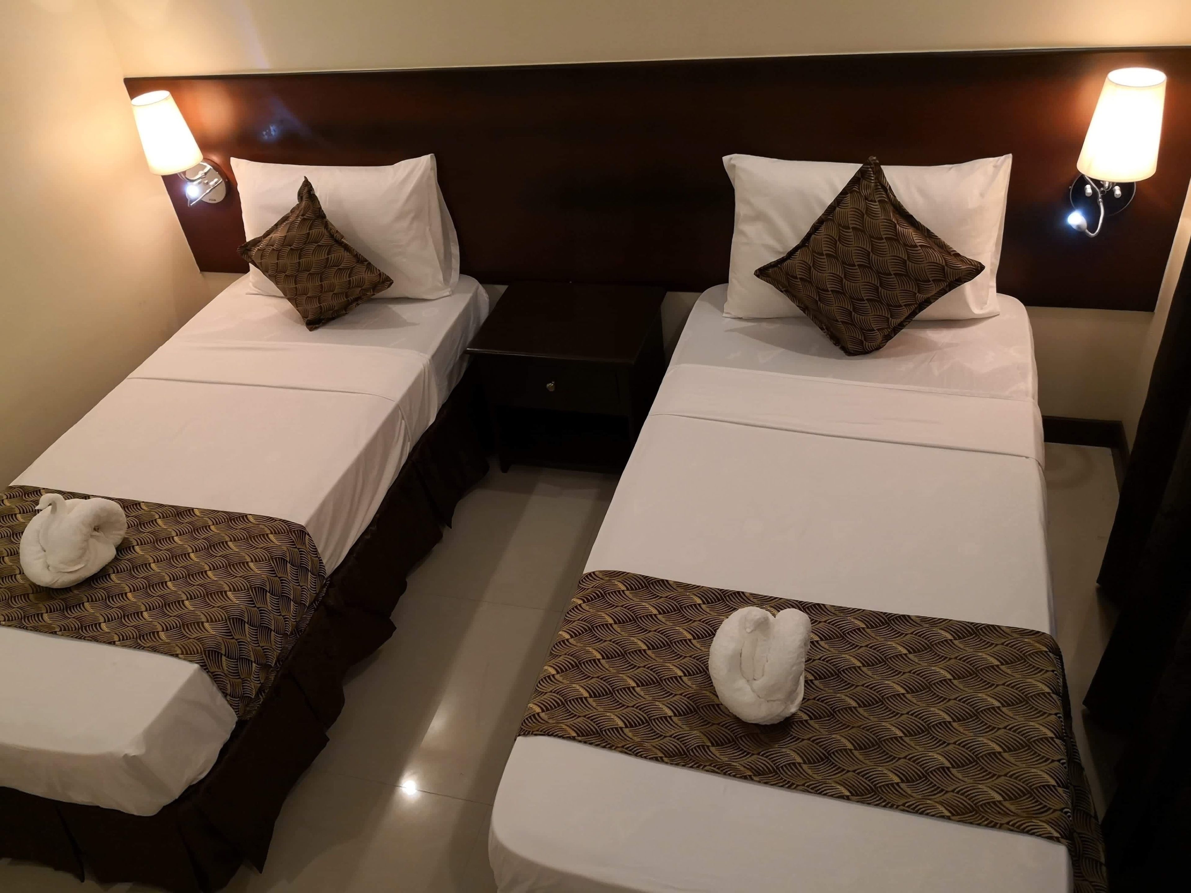 standard twin room | 1 bedroom, premium bedding, down duvets, rollaway beds