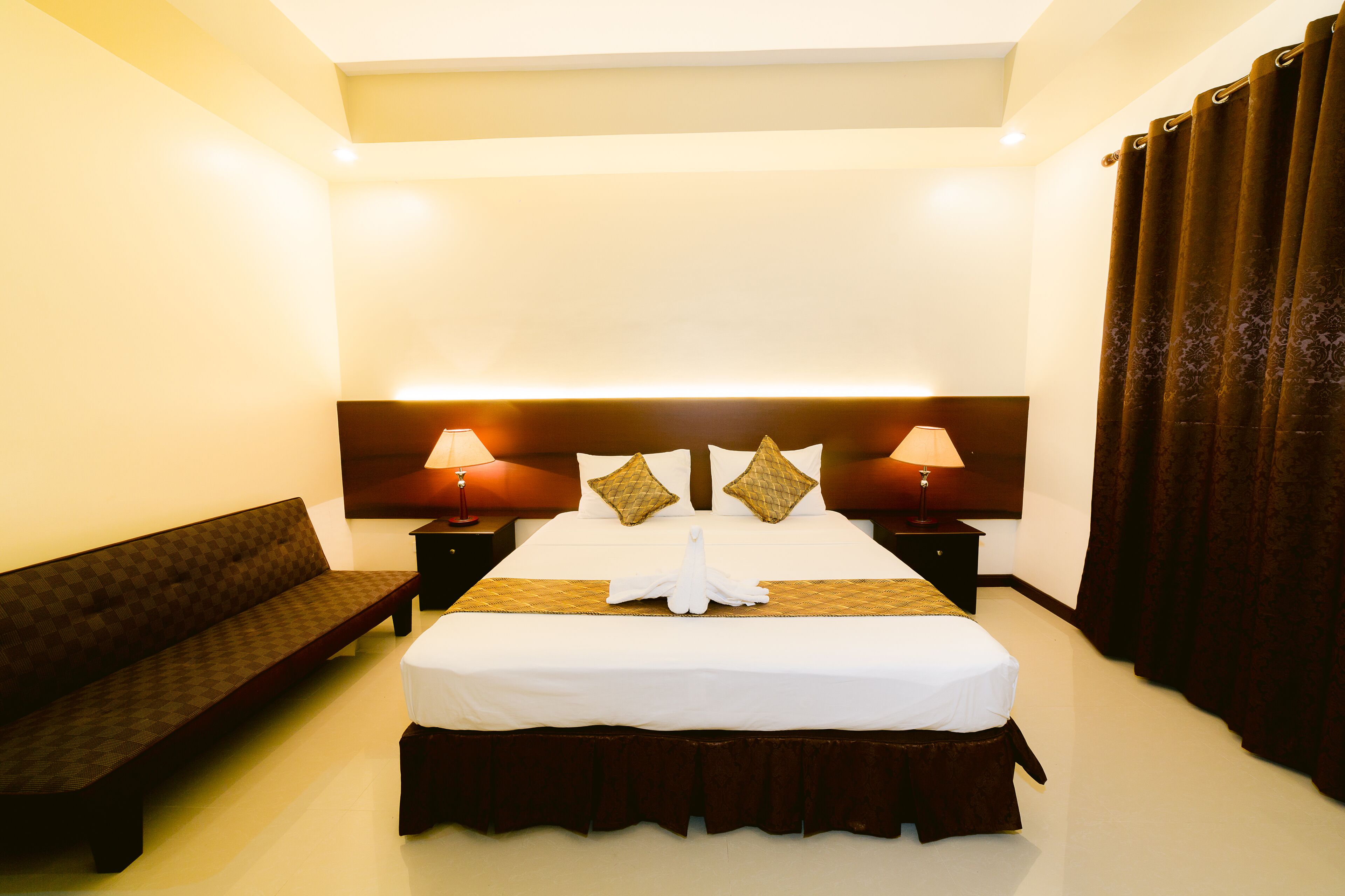 Premium bedding, down comforters, blackout drapes, rollaway beds