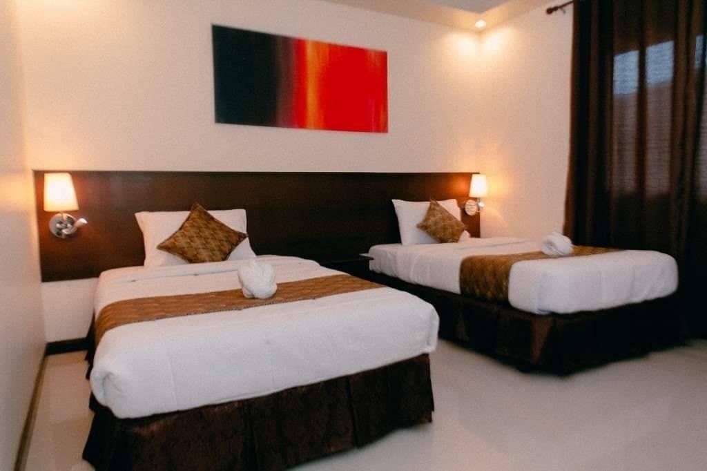 Premium bedding, down comforters, blackout drapes, rollaway beds