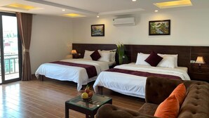 Family Suite, Balcony, Mountain View | Minibar, in-room safe, desk, blackout curtains - Sapa Meriton Boutique Hotel (Sa Pa)