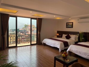 Family Suite, Balcony, Mountain View | Minibar, in-room safe, desk, blackout drapes - Sapa Meriton Boutique Hotel (Sa Pa)