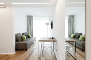 Suite Deluxe Cucina | Wohnbereich | Smart-TV