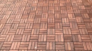Two white lounge chairs on a herringbone-patterned patio with brick walls. - Kleine Möwe (Dornum)