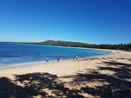 Private beach, white sand, sun loungers, beach massages
