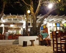 Breakfast, lunch, dinner served; local and international cuisine 