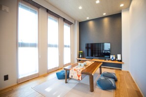 Appartement Design (Family Suite) | Literie de qualité supérieure, couette en duvet d'oie