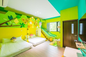 A brightly colored room with two beds, a small table, and a staircase. - Moonlight Fengqing Homestay (Xincheng)