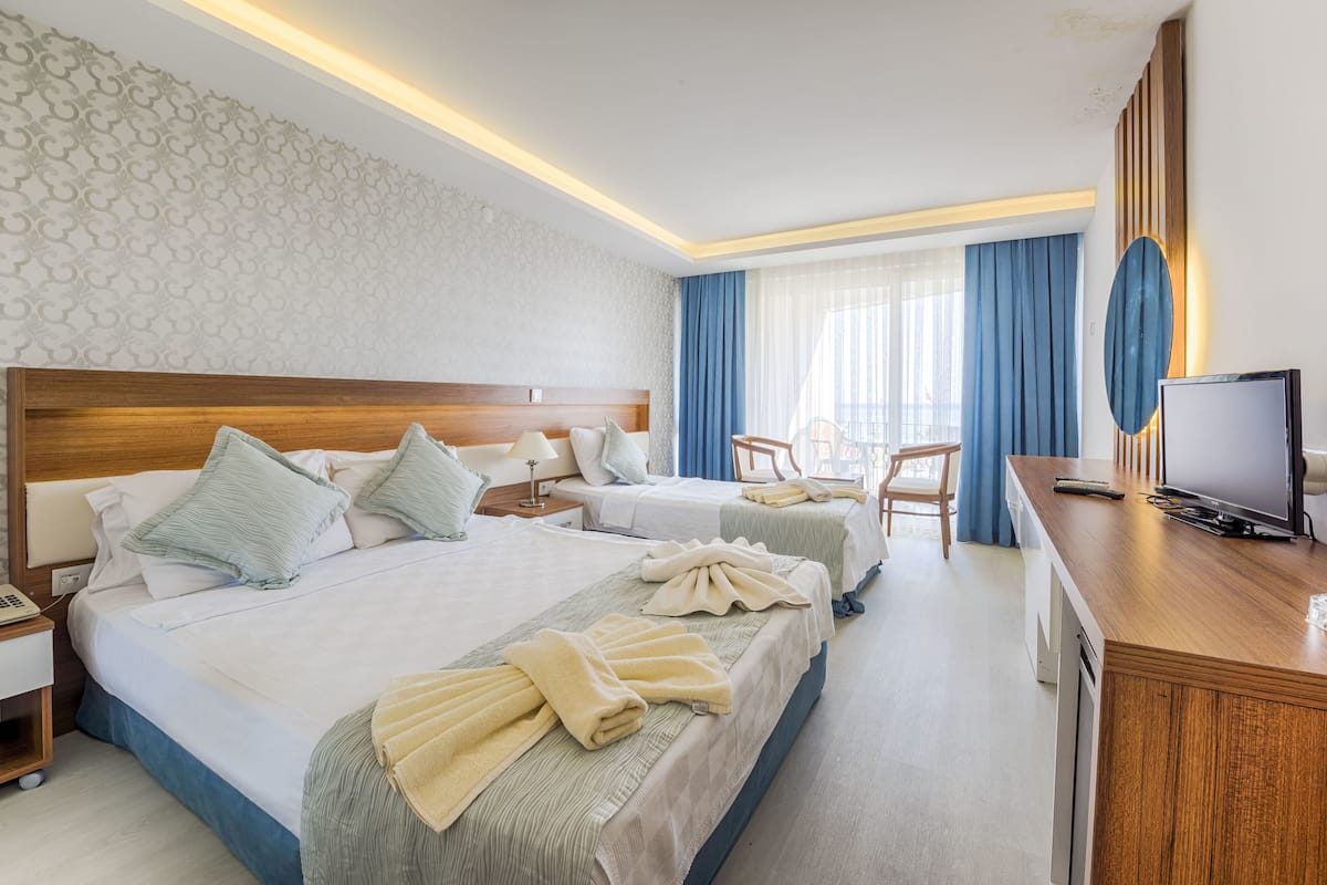 Habitación estándar | Ropa de cama de alta calidad y minibar