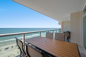 Outdoor dining - Beautifully remodeled, oceanfront condo + Free Attraction Tickets! (North Myrtle Beach)