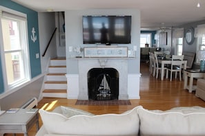 Smart TV, fireplace, DVD player, books