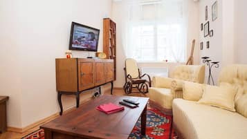 Apartemen | Area keluarga | TV layar datar