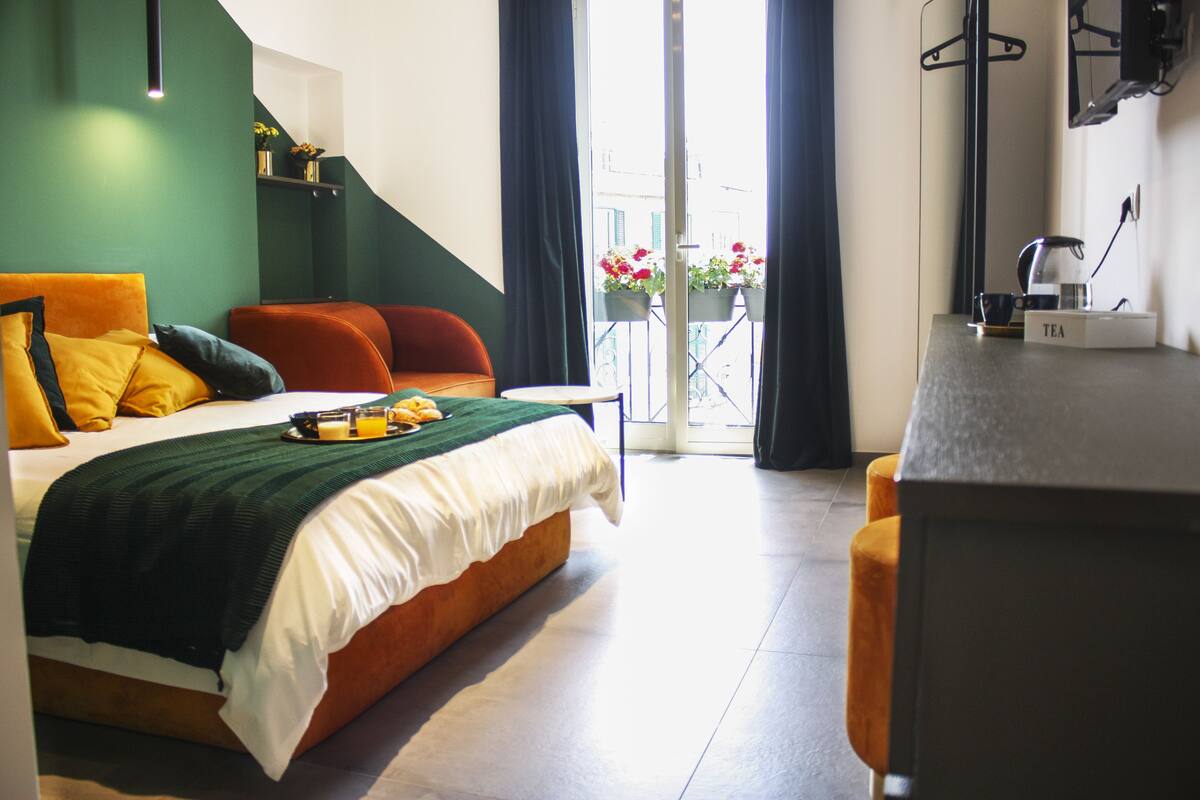 Chambre Deluxe, vue partielle sur la mer (Esagono) | Literie hypoallergénique, couette en duvet