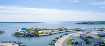 Lovely home, wraparound porch, waterfront, pools, beach, pet friendly!