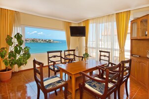 Basic Apartment, 1 Bedroom, Balcony, Sea View | Living area | 28-inch flat-screen TV with cable channels, TV